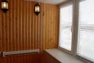 Обшивка балкона деревянными панелями